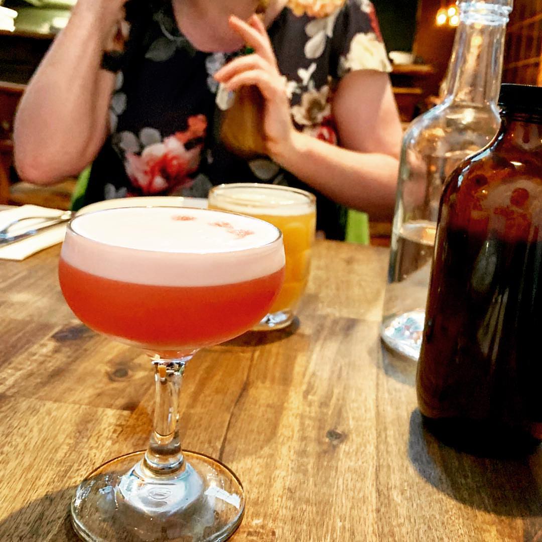 The square format of Instagram photos gave me the difficult choice of: do I focus on Amy? Or do I focus on this amazing plum cocktail? My choice was made when the neighboring table ordered exactly the same... the pretty pink plum cocktail for the guy, a beer for the girl. So this photo is doing double duty, you could see the same if you turn your head a little to the right.