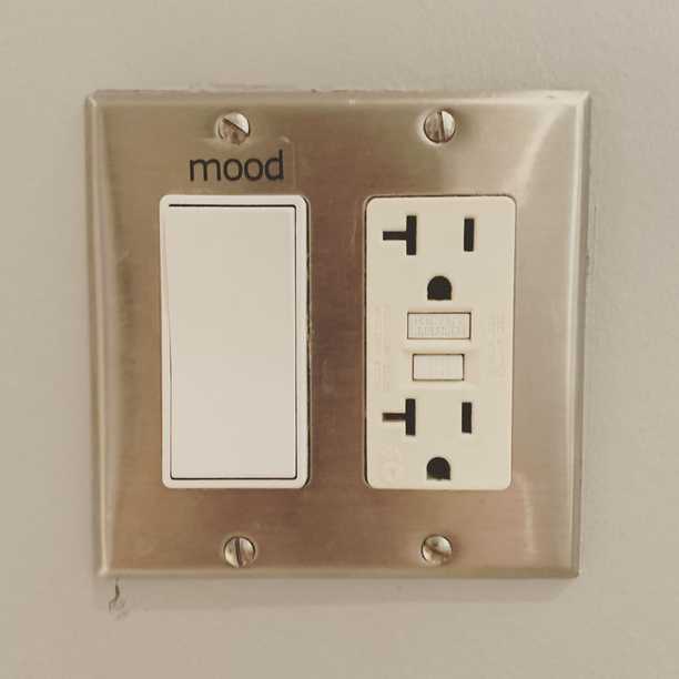 I think this is meant to be the “mood” lighting switch, but I keep reading it as the “doom” switch