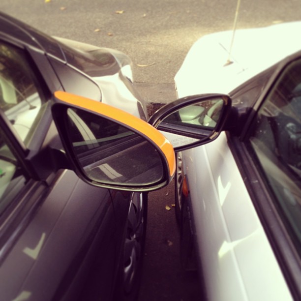 Righteous or obnoxious? I decided to put an end to cars parking at 75° in the 90° parking spots by being the only one to park within the lines.